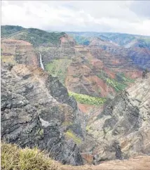  ??  ?? WAIMEA CANYON is known as the Grand Canyon of the Pacific for good reason and includes the 800-foot Waipoo Falls.