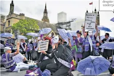  ??  ?? Women protesting outside Parliament in 2019 over state pension age changes