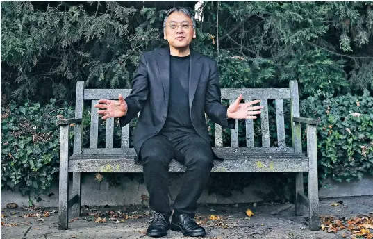  ??  ?? Nobel laureate Kazuo Ishiguro dedicated his win to goodwill and peace at a time of global uncertaint­y. Below, the world’s media on his doorstep