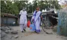  ?? Dasarath Deka/Zuma Press Wire/Rex/Shut- ?? A nurse and a health worker during a door-to-door vaccinatio­n drive in the Baksa district of Assam, India. Photograph: