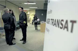  ?? ADRIAN WYLD/THE CANADIAN PRESS ?? Air Transat pilot Yves Saint-Laurent is seen as he returns for the afternoon session of a Canadian Transporta­tion Agency hearing Thursday in Ottawa.