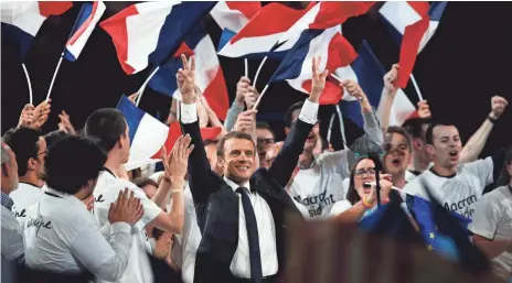  ?? YOAN VALET, EUROPEAN PRESSPHOTO AGENCY ?? French presidenti­al candidate Emmanuel Macron, from the centrist En Marche! (Onward!) political party, is in a tight race to succeed François Hollande.