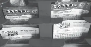  ?? NAM Y. HUH/ AP ?? The prize up for grabs in Friday’s Mega Millions drawing is the third- largest prize in U. S. lottery history.