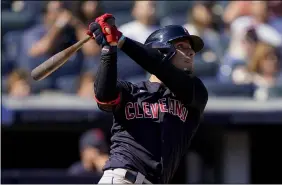  ?? JOHN MINCHILLO — THE ASSOCIATED PRESS ?? Andres Gimenez hits a three-run home run in the fifth inning Sept. 18.