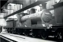  ?? DC SMITH/RM ARCHIVE ?? Former Highland Railway 'SmallBen' No.54398 BenAlder storedat the backof Dawsholm shed, Glasgow,in March1964.