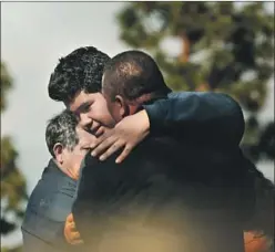  ?? Al Seib Los Angeles Times ?? PARENTS pick up their children after the lockdown at Sal Castro Middle School. The incident raised questions about the district’s safety measures.