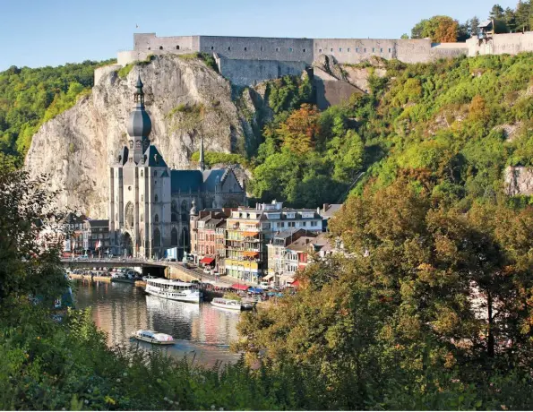  ?? ?? PICTURE POSTCARD Dinant Citadel sits among pretty houses and shops. WBT - ARNAUD SIQUET