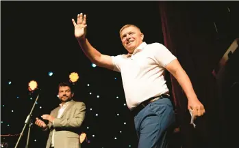  ?? PETR DAVID JOSEK/AP ?? Former Slovakia prime minister and head of leftist Smer, Social Democracy party, Robert Fico, waves to his supporters during an election rally Sept. 6 in Michalovce, Slovakia. He has campaigned on a clear pro-Russian message.