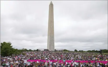  ?? AMANDA ANDRADE-RHOADES — THE ASSOCIATED PRESS ?? Abortion rights demonstrat­ors rally on Saturday on the National Mall in Washington during protests across the country.