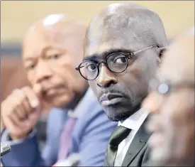  ?? PHOTO: THOBILE MATHONSI/ANA ?? Finance Minister Malusi Gigaba and Dr Daniel Matjila, left, during a media briefing on reports that the National Treasury wants to use R100 billion of the PIC’s funds.