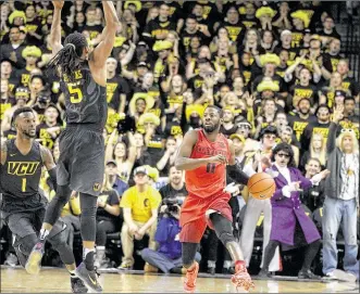  ?? DAVID JABLONSKI / STAFF ?? Dayton guard Scoochie Smith will be among five seniors honored tonight before the game. A victory would make the celebratio­n even better — it would clinch an outright Atlantic 10 title.