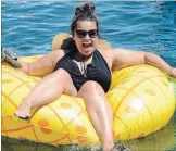  ?? DAVE JOHNSON
THE WELLAND TRIBUNE ?? A Floatfest participan­t is all smiles as she takes part in the third annual event on the Welland Recreation­al Canal at the Lincoln Street Docks on Sunday.