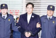  ??  ?? File photo of Samsung Group chief, Jay Y. Lee at the office of the independen­t counsel team in Seoul, South Korea, February 19, 2017. Samsung Group, South Korea’s leading conglomera­te, has no ‘Plan B’ for taking big decisions if its billionair­e de...