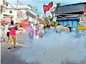  ?? PTI ?? Left Democratic Front (LDF) activists celebrate party’s winning trend during counting day of Kerala state Assembly Polls, in Thiruvanan­thapuram on Sunday.
—