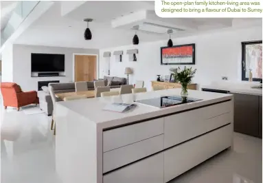  ??  ?? The open-plan family kitchen-living area was designed to bring a flavour of Dubai to Surrey