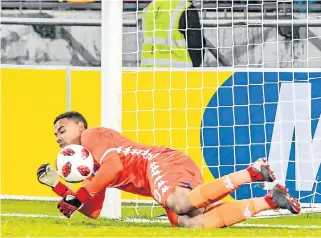  ?? /Sydney Seshibedi/Gallo Images ?? Dive master: Ronwen Williams of SuperSport United saves a penalty that helped his team defeat Orlando Pirates in an MTN8 quarterfin­al game late on Saturday night.