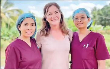  ?? SUPPLIED ?? (From left) Phann Vatana, Lori Housworth and Phang Marina at the Mondulkiri referral hospital.