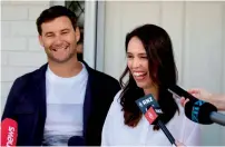  ?? AFP ?? New Zealand Prime Minister Jacinda Ardern and her partner Clarke Gayford announce they are expecting their first child, in Auckland on Friday. —