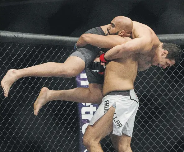  ?? — THE CANADIAN PRESS FILES ?? Arjan Singh Bhullar of Canada won his debut fight over Luis Henrique of Brazil at UFC 215 in Edmonton on Sept. 9, 2017, and is reportedly going to step in the octagon next on April 14. The Sikh-Canadian is the first fighter of Indian heritage in the UFC.