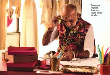  ??  ?? Designer manish Arora at work in his studio