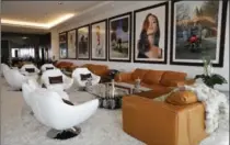  ??  ?? A lounge area decorated with photograph­s of celebritie­s.