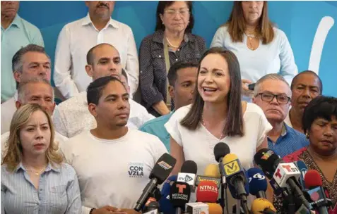  ?? FOTO: ?? ENOJO. La opositora María Corina Machado ofreció una conferenci­a de prensa en la sede de su partido en Caracas.
AFP