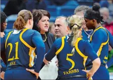  ?? STEPHEN DUNN/AP PHOTO ?? Quinnipiac coach Tricia Fabbri huddles with her team during Saturday’s 86-72 win over Miami in the first round of the NCAA tournament in Storrs. The No. 9 Bobcats play top-seeded UConn in the second round on tonight at Gampel Pavilion.