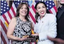  ??  ?? All smiles . . . Democrat Alexandria OcasioCort­ez stands with her mother before a ceremonial swearingin picture on Capitol Hill in Washington.