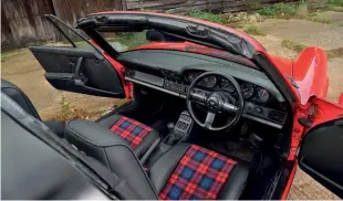  ??  ?? Above Interior has been retrimmed in black leather and 1980s-tastic tartan fabric