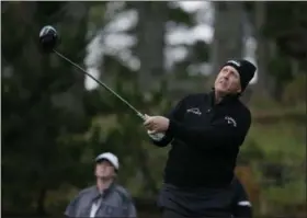  ?? ERIC RISBERG - THE ASSOCIATED PRESS ?? Phil Mickelson follows his drive from the 11th tee of the Spyglass Hill Golf Course during the second round of the AT&amp;T Pebble Beach National Pro-Am golf tournament Friday, Feb. 8, 2019, in Pebble Beach, Calif.