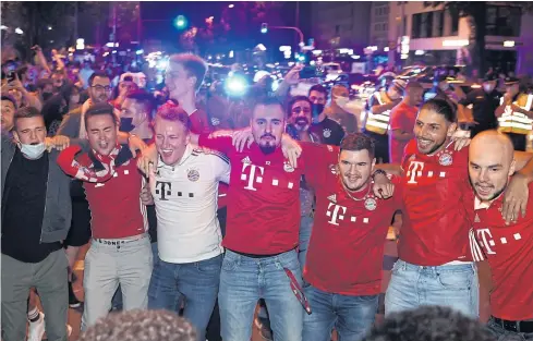  ?? REUTERS ?? Bayern Munich fans celebrate after their team won the Champions League last month.