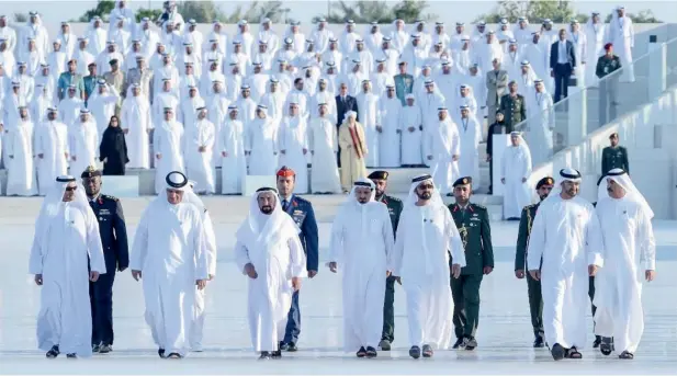  ??  ?? Sheikh Mohammed bin Rashid and Sheikh Mohamed bin Zayed with Rulers of the Emirates during the Commemorat­ion Day ceremony at the Martyrs’ Monument in Abu Dhabi on Thursday.