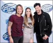  ?? Invision/AP/DAN STEINBERG ?? American Idol, starring judges (from left) Keith Urban, Jennifer Lopez and Harry Connick Jr., will go off the air after its 15th season next spring.