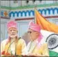  ?? PTI ?? PM Narendra Modi and his Nepal counterpar­t KP Oli during the inaugurati­on of Janakpuray­odhya bus service on Friday
