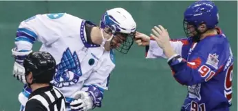  ?? STEVE RUSSELL/TORONTO STAR ?? The Rock’s Billy Hostrawser gets into it with Rochester’s Derek Searle at the end of Thursday’s game.