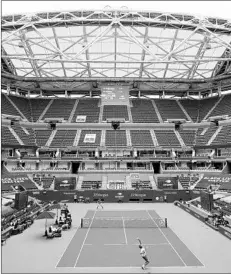  ?? FRANK FRANKLIN/AP ?? Alexander Zverev serves to Kevin Anderson in a first-round match Monday.