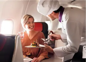  ??  ?? A Gourmet experience Business Class passengers on myaustrian will enjoy meals prepared by the on-board chef, who is also available to answer questions about the menu