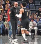  ?? PETRE THOMAS/USA TODAY SPORTS ?? Grizzlies head coach Taylor Jenkins, left, reacts with guard Scotty Pippen Jr., during the second half against the Lakers at Fedexforum in Memphis on Friday.