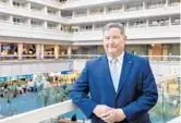  ?? WILLIE J. ALLEN JR./ORLANDO SENTINEL ?? Orlando Internatio­nal Airport CEO Phil Brown stands inside the airport’s main terminal Jan. 14.