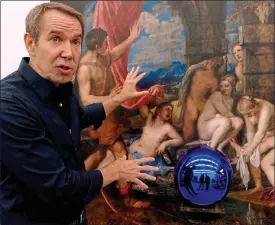  ??  ?? Feeling blue: Jeff Koons in front of a work from his series of Gazing Ball Paintings Nathaniel Kahn’s documentar­y dives into the fickle, everflexib­le art marketThe film is a compelling and subtle debate about where great art belongs