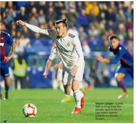  ??  ?? Impact player: Gareth Bale scoring from the penalty spot in the La Liga match against Levante on Sunday. — Reuters