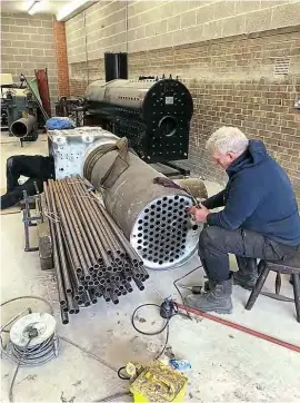  ??  ?? Tubes being fitted in the replica of 1863-built Mountainee­r’s boiler. NBRES