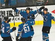  ?? AP ?? San Jose Sharks’ Tomas Hertl (centre) celebrates after scoring against the Anaheim Ducks in the play-off series.