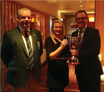  ??  ?? County Sligo Captain Joe Keyes with sponsor Shéana Henry (Bank of Ireland) presenting the Frank Doherty Cup to Shane Flanagan (winner was his brother Kevin Flanagan).