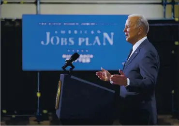  ?? EVAN VUCCI — THE ASSOCIATED PRESS ?? President Joe Biden discusses infrastruc­ture spending at Carpenters Pittsburgh Training Center, Wednesday in Pittsburgh.
