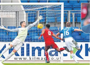  ??  ?? St Johnstone’s David Mcmillan, right, opens the scoring at Mcdiarmid Park