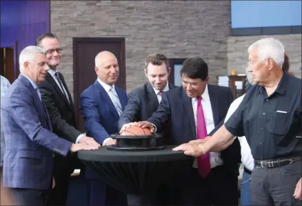  ?? PHOTOS BY CHARLES PRITCHARD - ONEIDA DAILY DISPATCH ?? Members of the Oneida Indian Nation, Caesars Entertainm­ent and local government officials open The Lounge at Turning Stone Casino and Resort with the shot clock on Thursday, Aug. 1, 2019.