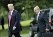  ?? THE ASSOCIATED PRESS ?? President Donald Trump walks with National Security Adviser H.R. McMaster from the Oval Office to Marine One on the South Lawn of the White House in Washington on Friday for a short trip to Andrews Air Force Base, Md., then onto Miami.