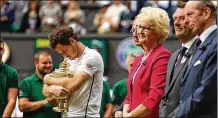  ?? ALASTAIR GRANT / ASSOCIATED PRESS (LEFT); JULIAN FINNEY / GETTY IMAGES (RIGHT) ?? Golfer Sergio Garcia (left), with fiancée Angela Akins, wore his traditiona­l green Masters winners’ jacket to Wimbledon, but its players must wear the traditiona­l white, as Andy Murray (right) did winning the men’s singles final in 2016.