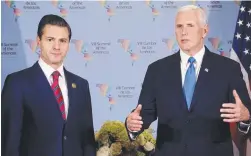  ?? Picture: KAREL ?? US Vice President Mike Pence with Mexico's President Enrique Pena Nieto at the Americas Summit in Lima, Peru, on the weekend.